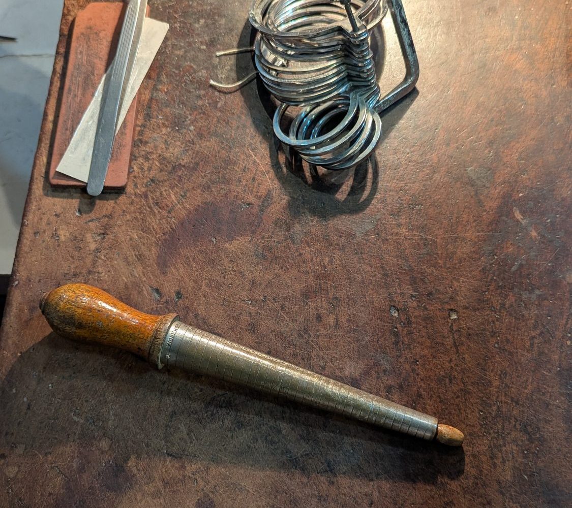 Bench tools laid out in the order they are used.